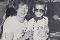 Peter Powell with child at VCGB party 1979